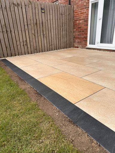 Porcelain Patio with Charcoal Edging – Adel London Beige porcelain patio with charcoal edging in Adel, Leeds LS16